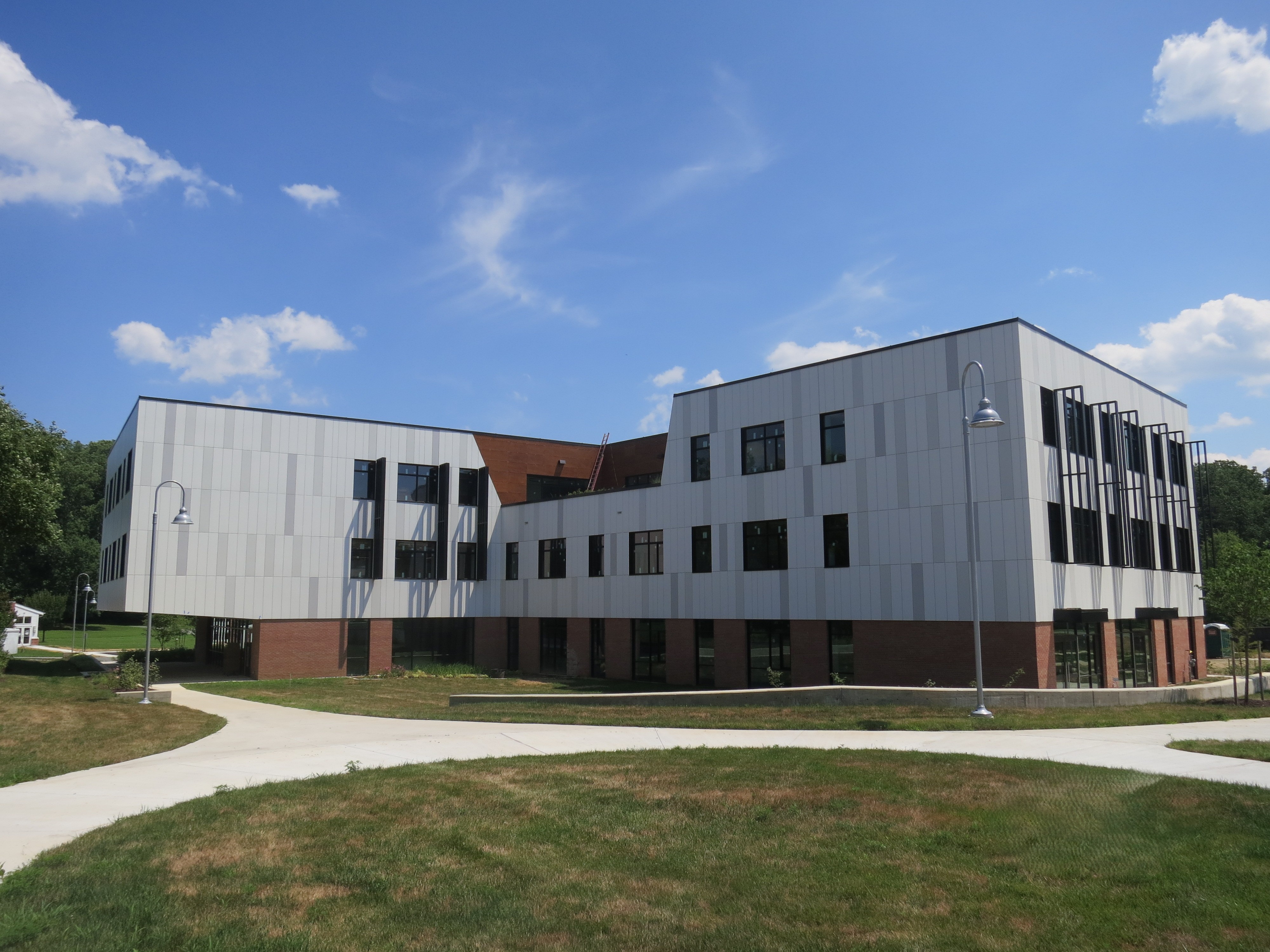 Fiber cement rainscreen panels on a mixed-use building facade in Maryland for durable exterior cladding