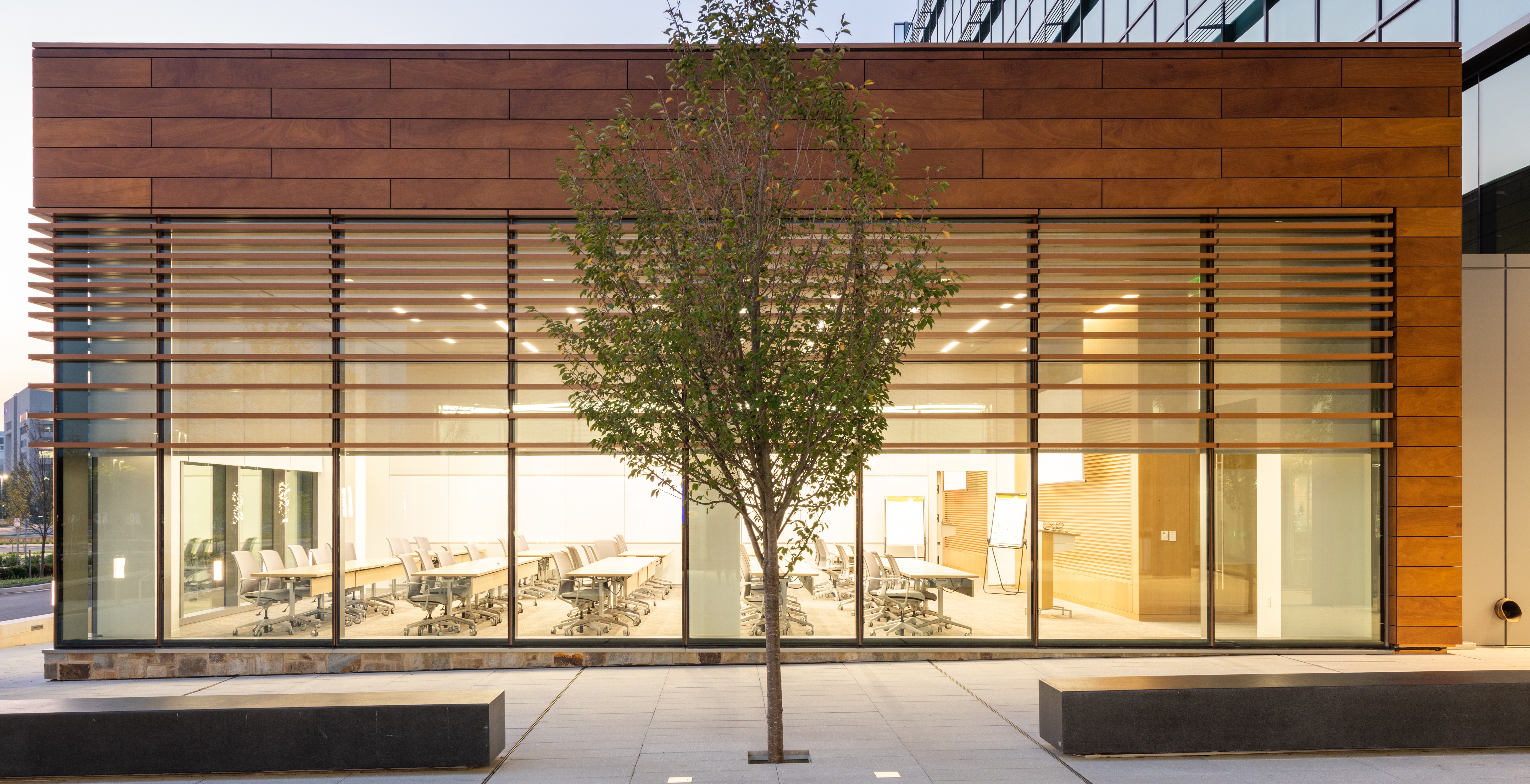 High-pressure laminate HPL rainscreen panels with wood-grain finish for commercial facade cladding